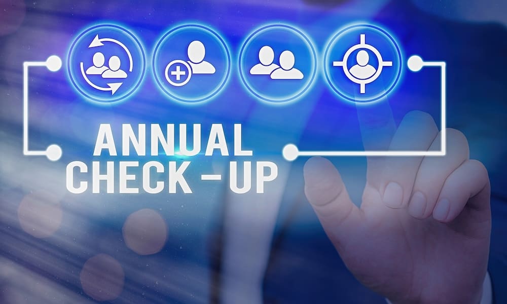 Handwriting text writing Annual Checkup. Concept meaning yearly reproductive health visit with a health care provider Information digital technology network connection infographic elements icon.